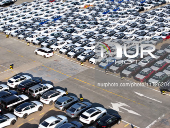 A large number of vehicles gather for loading at the terminal of Oriental Port Branch in Lianyungang Port in Lianyungang, China, on October...