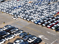 A large number of vehicles gather for loading at the terminal of Oriental Port Branch in Lianyungang Port in Lianyungang, China, on October...