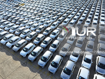 A large number of vehicles gather for loading at the terminal of Oriental Port Branch in Lianyungang Port in Lianyungang, China, on October...