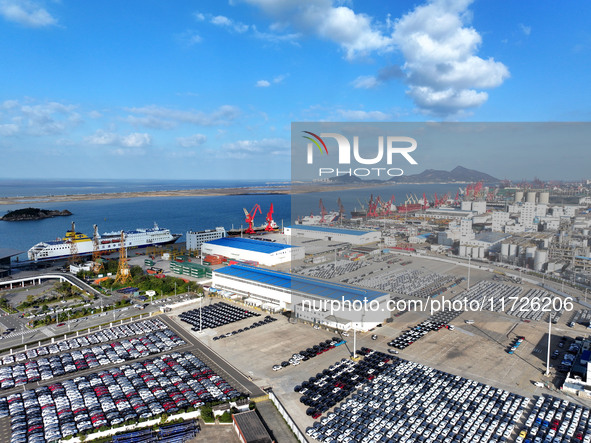 A large number of vehicles gather for loading at the terminal of Oriental Port Branch in Lianyungang Port in Lianyungang, China, on October...