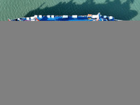 A large number of vehicles gather for loading at the terminal of Oriental Port Branch in Lianyungang Port in Lianyungang, China, on October...