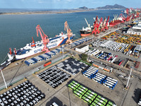 A large number of vehicles gather for loading at the terminal of Oriental Port Branch in Lianyungang Port in Lianyungang, China, on October...