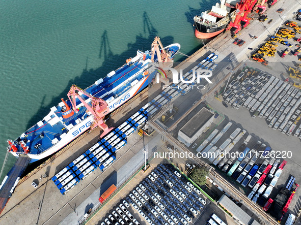 A large number of vehicles gather for loading at the terminal of Oriental Port Branch in Lianyungang Port in Lianyungang, China, on October...