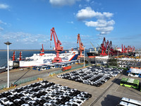 A large number of vehicles gather for loading at the terminal of Oriental Port Branch in Lianyungang Port in Lianyungang, China, on October...