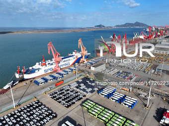 A large number of vehicles gather for loading at the terminal of Oriental Port Branch in Lianyungang Port in Lianyungang, China, on October...