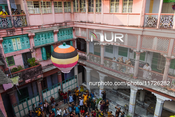 People release paper lanterns in celebration of the Diwali festival, promoting an eco-friendly celebration of Diwali in Kolkata, India, on O...