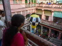 People observe lanterns being released during the Diwali festival celebration in Kolkata, India, on October 31, 2024. (