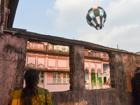 People observe lanterns being released during the Diwali festival celebration in Kolkata, India, on October 31, 2024. (