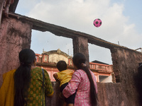 People observe lanterns being released during the Diwali festival celebration in Kolkata, India, on October 31, 2024. (