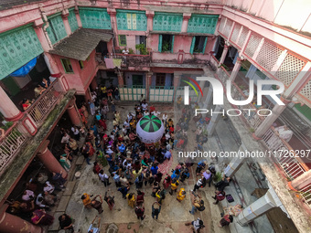 People release paper lanterns in celebration of the Diwali festival, promoting an eco-friendly celebration of Diwali in Kolkata, India, on O...