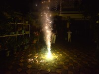 People burst firecrackers to celebrate Diwali in Nagaon District, Assam, India, on October 31, 2024. (