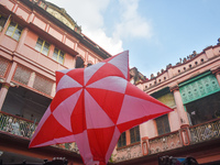 People celebrate The Fanush (a paper-made hot air balloon) festival inside an old house to mark the Diwali festival in Kolkata, India, on Oc...