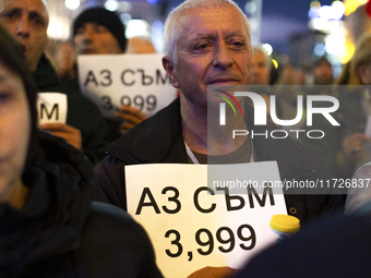 Supporters of the Velichie political party protest in front of the National Assembly building in Sofia, Bulgaria, on October 31, 2024. They...