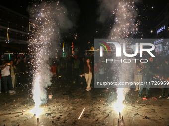 Tourists burst crackers on the day of Diwali in Srinagar, Indian Administered Kashmir, on October 31, 2024. (