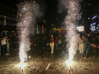 Tourists burst crackers on the day of Diwali in Srinagar, Indian Administered Kashmir, on October 31, 2024. (