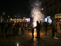 Tourists burst crackers on the day of Diwali in Srinagar, Indian Administered Kashmir, on October 31, 2024. (