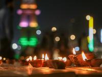 Tourists light candles on the day of Diwali in Srinagar, Indian Administered Kashmir, on October 31, 2024. (