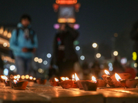 Tourists light candles on the day of Diwali in Srinagar, Indian Administered Kashmir, on October 31, 2024. (