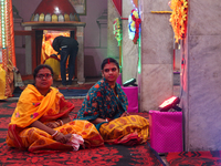 Non-local Hindus sit inside a temple on the day of Diwali in Srinagar, Indian Administered Kashmir, on October 31, 2024. (