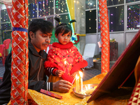 Non-local Hindus light candles on the day of Diwali in Srinagar, Indian Administered Kashmir, on October 31, 2024. (