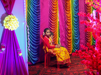 Non-local Hindus sit inside a temple on the day of Diwali in Srinagar, Indian Administered Kashmir, on October 31, 2024. (