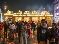 Tourists light candles on the day of Diwali in Srinagar, Indian Administered Kashmir, on October 31, 2024. (