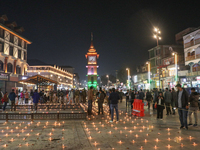 Tourists light candles on the day of Diwali in Srinagar, Indian Administered Kashmir, on October 31, 2024. (