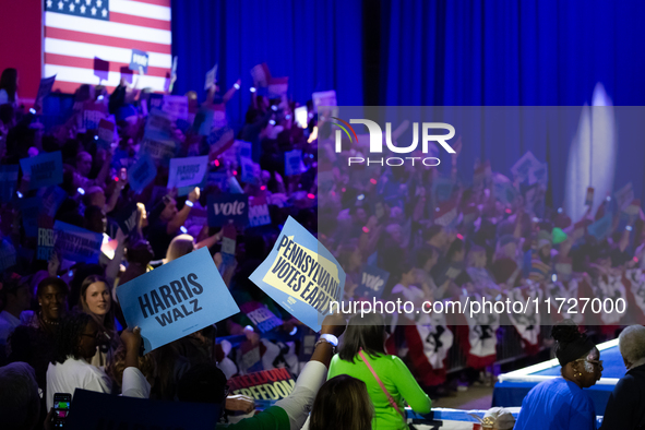 People await remarks by Vice President Kamala Harris at a get out the vote rally in Harrisburg, PA, on October 30, 2024.  Harris and her run...