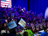 People await remarks by Vice President Kamala Harris at a get out the vote rally in Harrisburg, PA, on October 30, 2024.  Harris and her run...