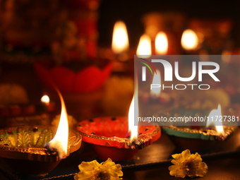 Diyas (small clay lamps) are lit during the festival of Diwali at a Hindu temple in Toronto, Ontario, Canada, on October 31, 2024. (