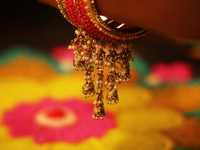 The ornaments on the bangle of a Hindu woman during the festival of Diwali at a Hindu temple in Toronto, Ontario, Canada, on October 31, 202...