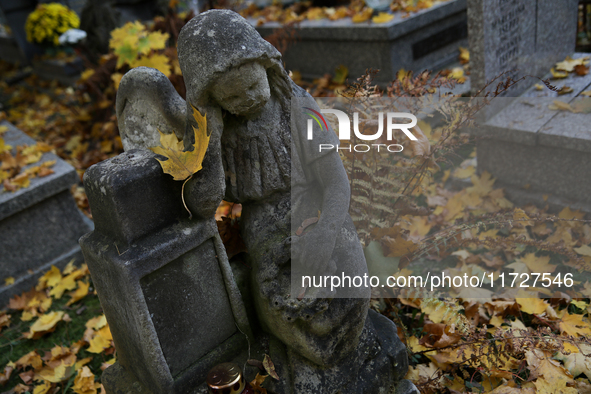 A tombstone in the form of a sculpture stands at the Rakowicki Cemetery during preparations for All Saints' Day in Krakow, Poland, on Octobe...