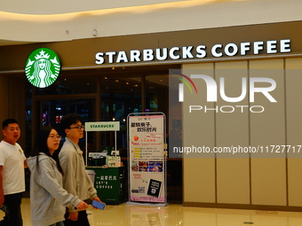 A Starbucks store is seen in Yichang, Hubei province, China, on October 31, 2024. Coffee company Starbucks reports revenue of $9.07 billion...