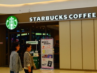 A Starbucks store is seen in Yichang, Hubei province, China, on October 31, 2024. Coffee company Starbucks reports revenue of $9.07 billion...