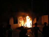 Unidentified people set fire to the headquarters of the Jatiya Party, which supports former Prime Minister Sheikh Hasina, in Dhaka, Banglade...