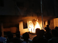 Unidentified people set fire to the headquarters of the Jatiya Party, which supports former Prime Minister Sheikh Hasina, in Dhaka, Banglade...