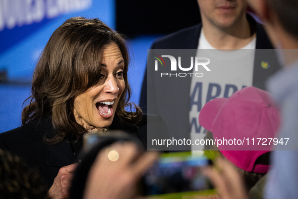 Vice President Kamala Harris reacts to someone in the crowd as she greets people after speaking at a get out the vote rally in Harrisburg, P...