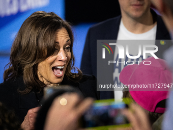 Vice President Kamala Harris reacts to someone in the crowd as she greets people after speaking at a get out the vote rally in Harrisburg, P...