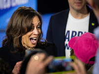 Vice President Kamala Harris reacts to someone in the crowd as she greets people after speaking at a get out the vote rally in Harrisburg, P...