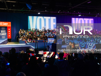 People attend a get out the vote rally with Vice President Kamala Harris in Harrisburg, PA, on October 30, 2024.  Harris and her running mat...