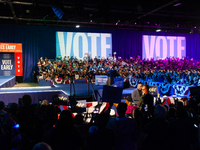 People attend a get out the vote rally with Vice President Kamala Harris in Harrisburg, PA, on October 30, 2024.  Harris and her running mat...