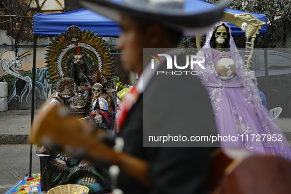 An image of Santa Muerte is seen as devotees attend the Altar of Santa Muerte located on Alfareria Street in the Tepito neighborhood to show...