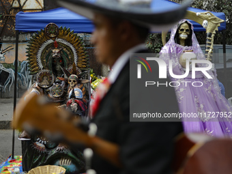 An image of Santa Muerte is seen as devotees attend the Altar of Santa Muerte located on Alfareria Street in the Tepito neighborhood to show...