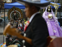 An image of Santa Muerte is seen as devotees attend the Altar of Santa Muerte located on Alfareria Street in the Tepito neighborhood to show...