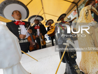 An image of Santa Muerte is seen as devotees attend the Altar of Santa Muerte located on Alfareria Street in the Tepito neighborhood to show...