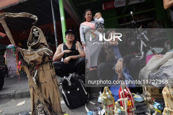 Devotees visit the Altar of Santa Muerte located on Alfareria Street in the Tepito neighborhood to show their devotion and give thanks for f...