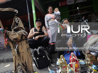 Devotees visit the Altar of Santa Muerte located on Alfareria Street in the Tepito neighborhood to show their devotion and give thanks for f...