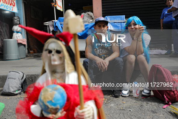 Devotees visit the Altar of Santa Muerte located on Alfareria Street in the Tepito neighborhood to show their devotion and give thanks for f...