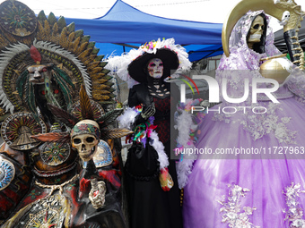 An image of Santa Muerte is seen as devotees attend the Altar of Santa Muerte located on Alfareria Street in the Tepito neighborhood to show...