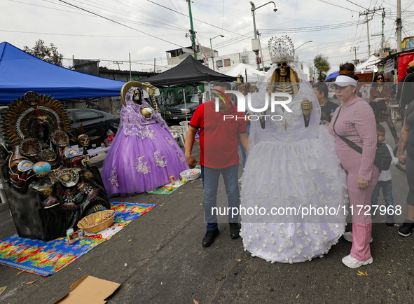 Devotees visit the Altar of Santa Muerte located on Alfareria Street in the Tepito neighborhood to show their devotion and give thanks for f...